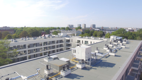 Zewnętrzny system grzewczy w apartamentowcu standardu premium